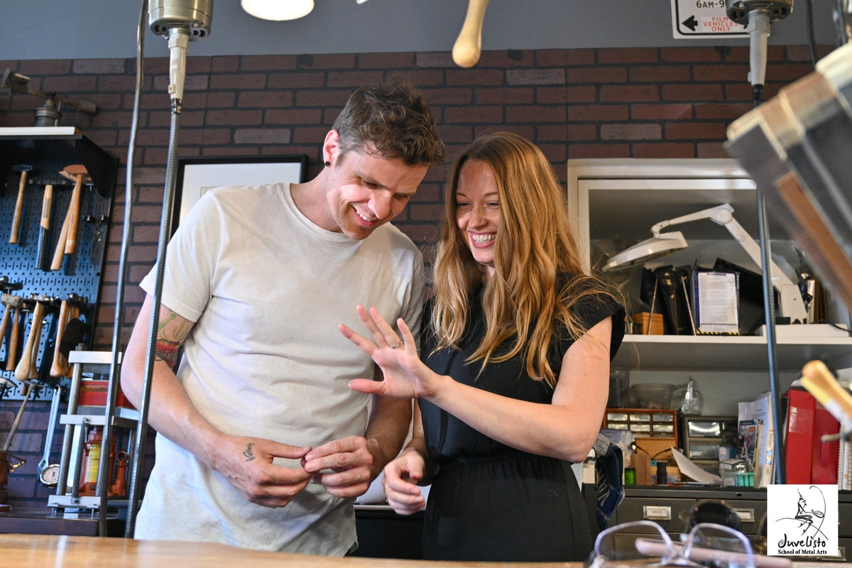 Dana and Shane admiring their finished wedding rings at the studio