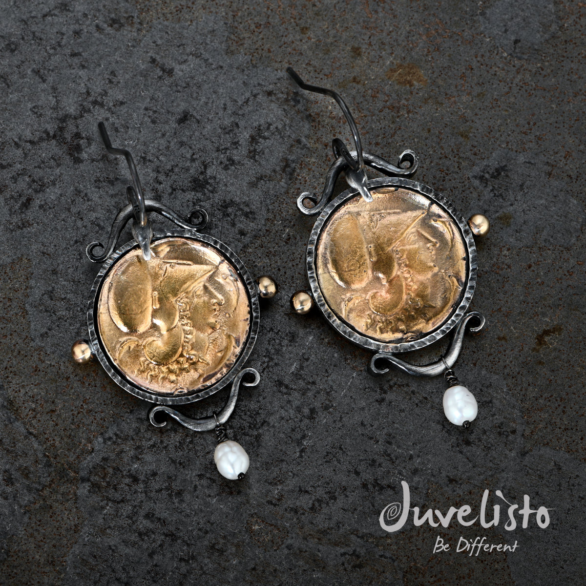 These exquisite ornate bird-like shepherd hooks earrings embody a timeless charm, showcasing sterling silver and bronze replicas of ancient Roman coins. 
