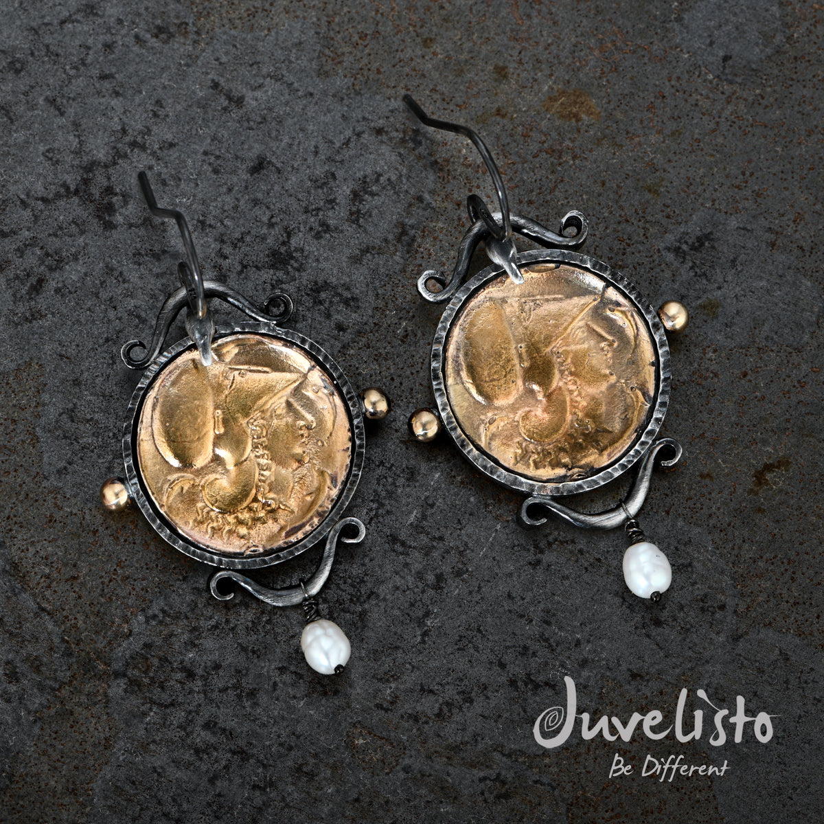 These exquisite ornate bird-like shepherd hooks earrings embody a timeless charm, showcasing sterling silver and bronze replicas of ancient Roman coins. 